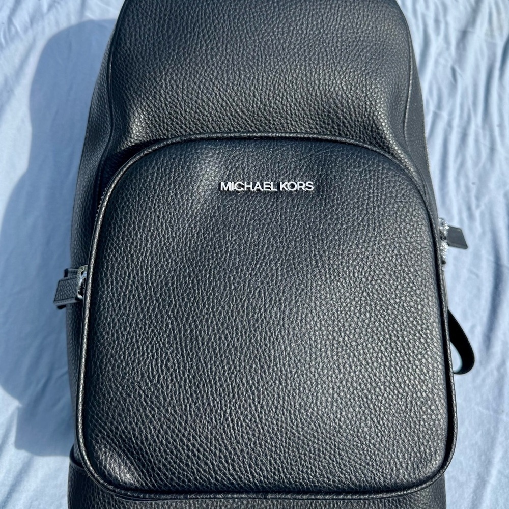 Michael Kors Cooper unisex sling pack, black pebbled leather.